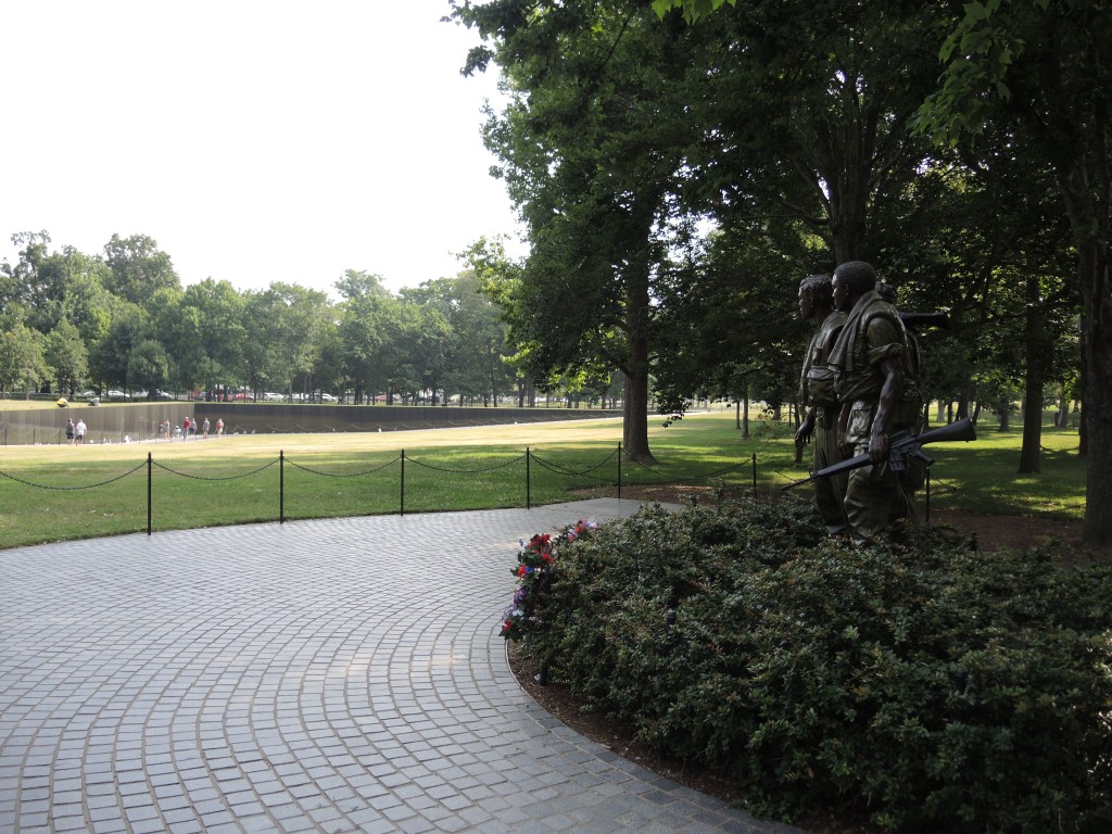"Three Infantrymen" Overlook the Vietnam Veterans Memorial